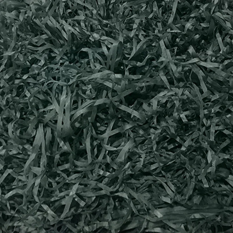 Riempimento per scatole regalo di caramelle in carta crespa triturata color rafia.