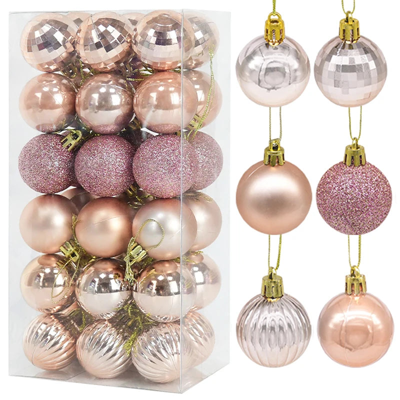 Palline di Natale decorative in plastica color rosa, oro e colori assortiti, confezionate in scatola.