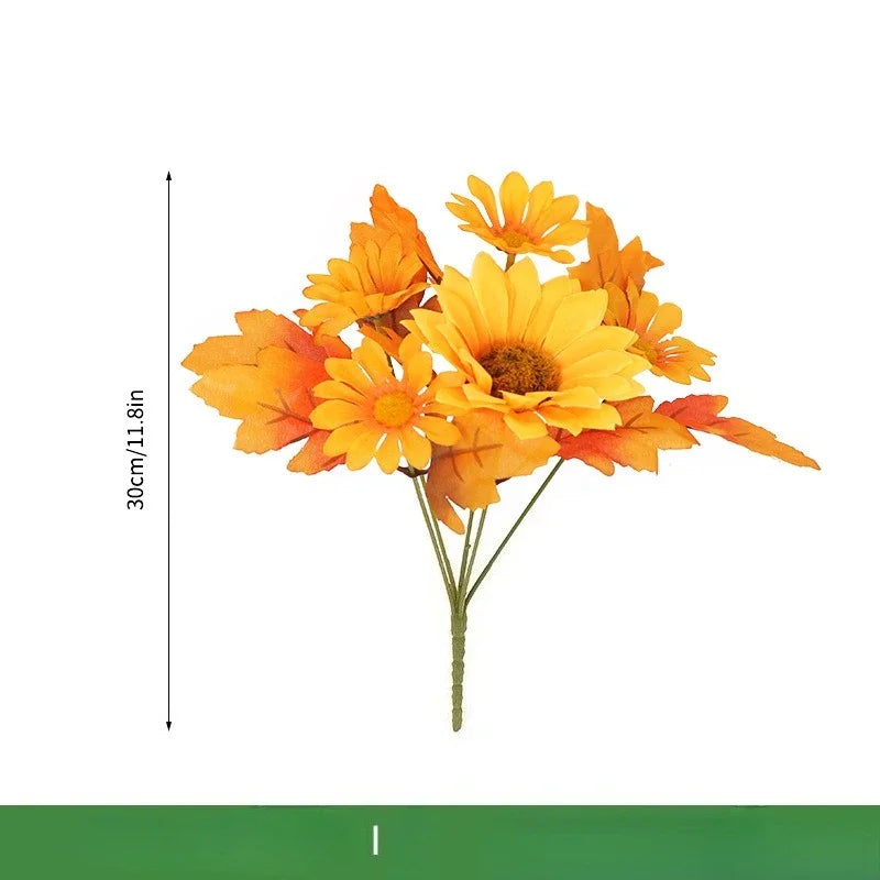 Bouquet di arance natalizie con girasoli artificiali e foglie d'acero