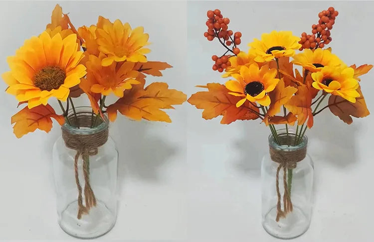 Bouquet di arance natalizie con girasoli artificiali e foglie d'acero