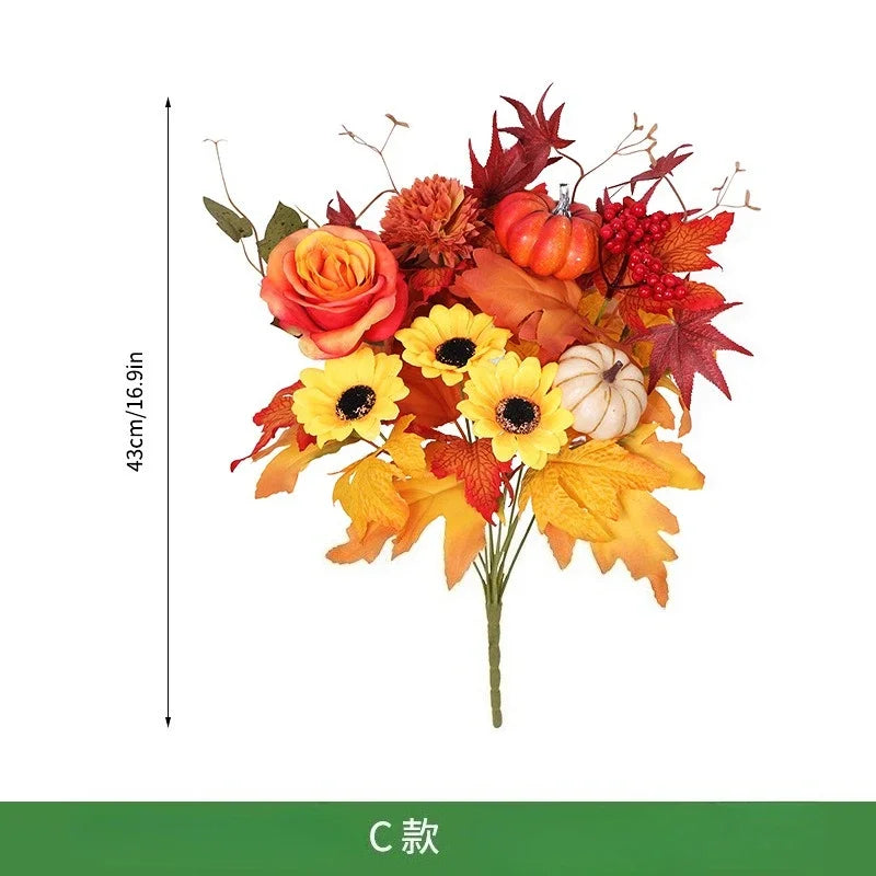 Bouquet di arance natalizie con girasoli artificiali e foglie d'acero