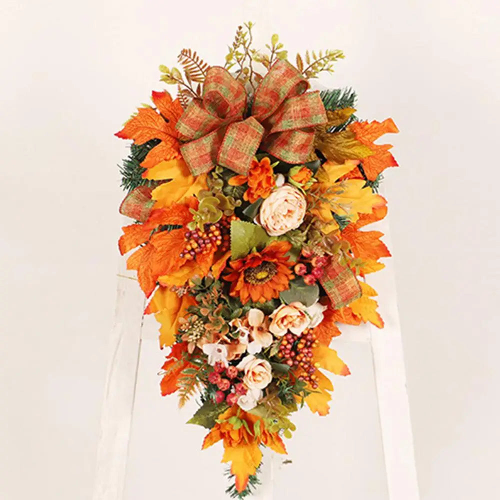 Decorazioni per la porta d'ingresso: ghirlanda autunnale con zucche.