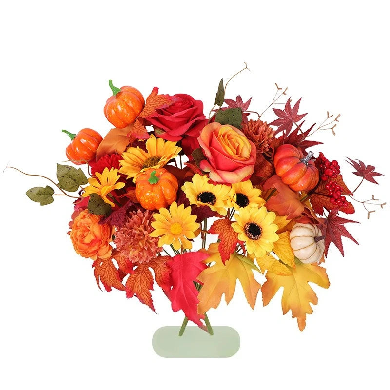 Bouquet di arance natalizie con girasoli artificiali e foglie d'acero