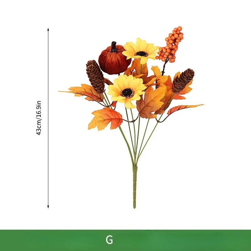 Bouquet di arance natalizie con girasoli artificiali e foglie d'acero