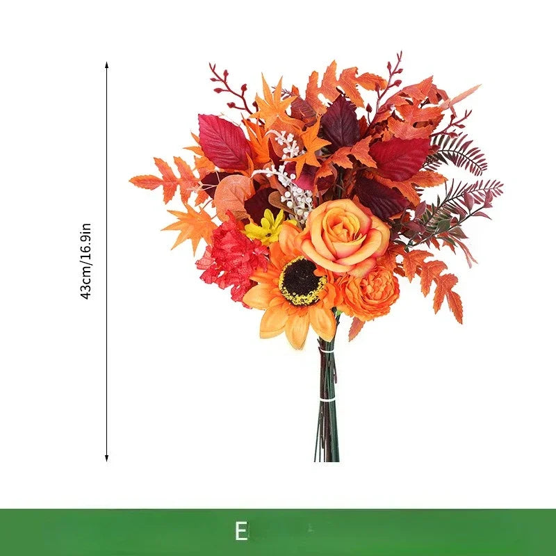 Bouquet di arance natalizie con girasoli artificiali e foglie d'acero