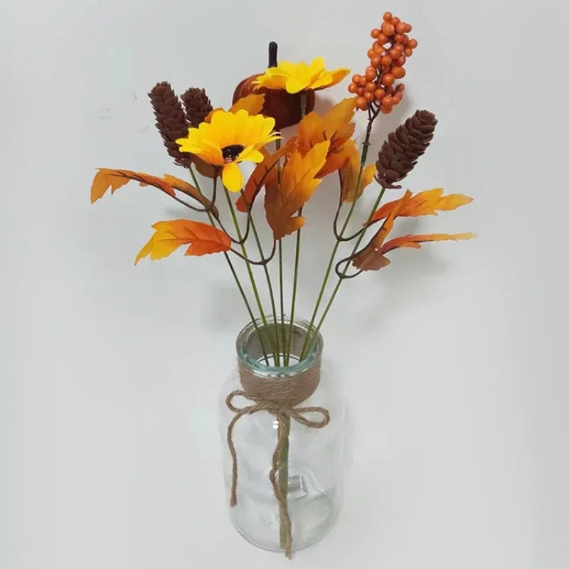 Bouquet di arance natalizie con girasoli artificiali e foglie d'acero