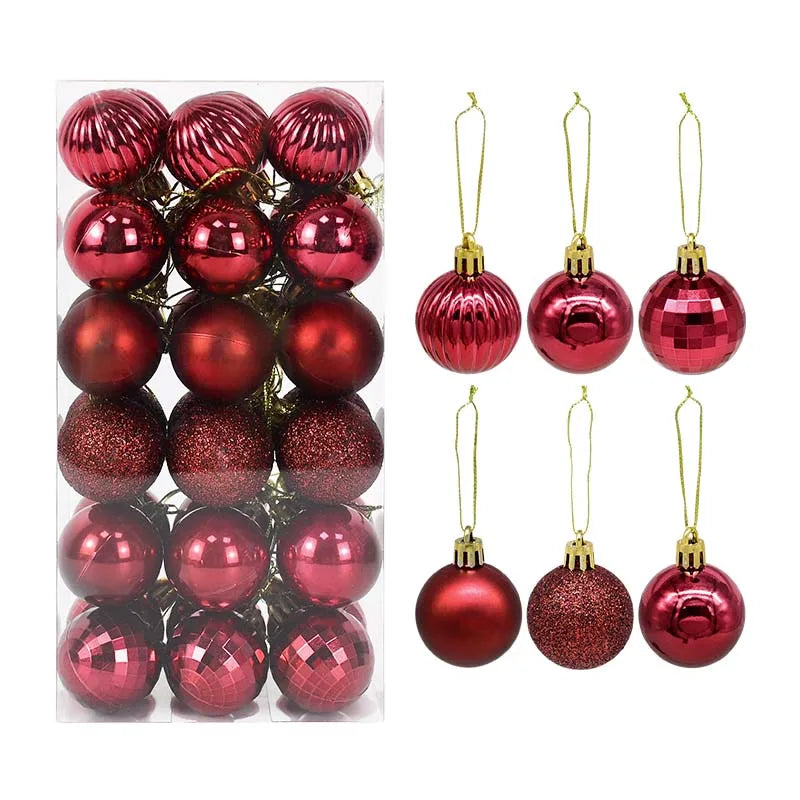 Palline di Natale decorative in plastica color rosa, oro e colori assortiti, confezionate in scatola.